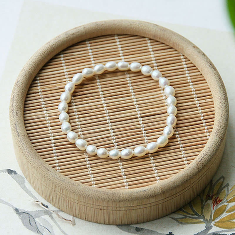Armband Perle – Heilung weiße Perlen elastisch Holzschale Dekoration