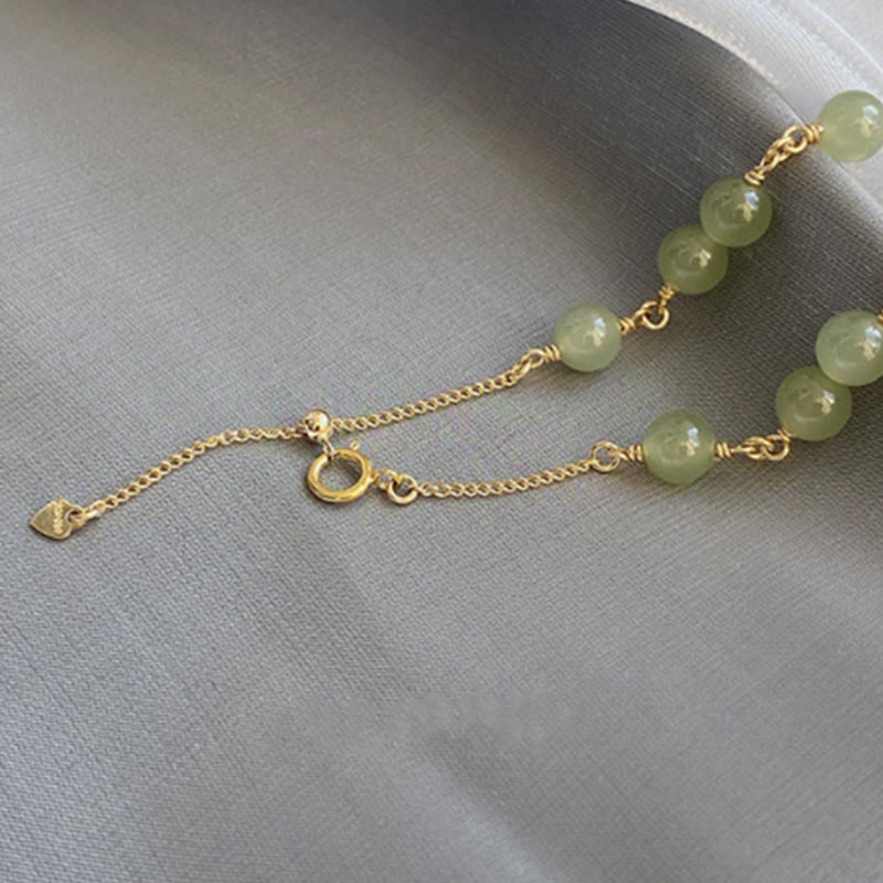 Armband Jade Gold – Wohlstand grüne Jade Perlen goldene Kette elegant