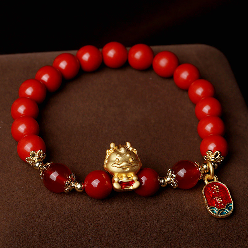 Rotes Armband Zinnober Drachen – Schutz mit goldener Lachender Buddha Perle.