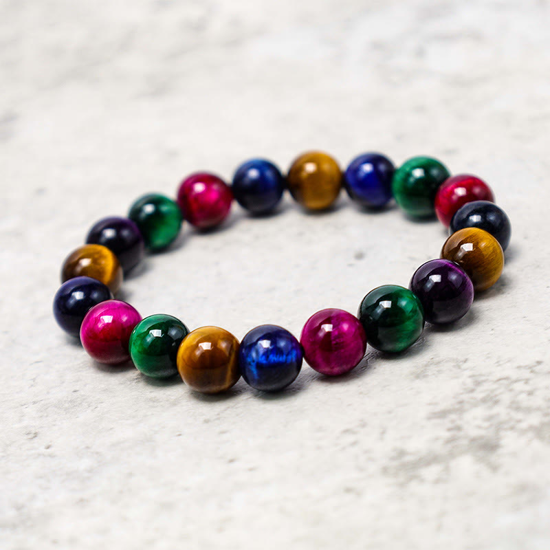 Armband Tigerauge – Mut bunte Perlen Naturstein elastisch getragen