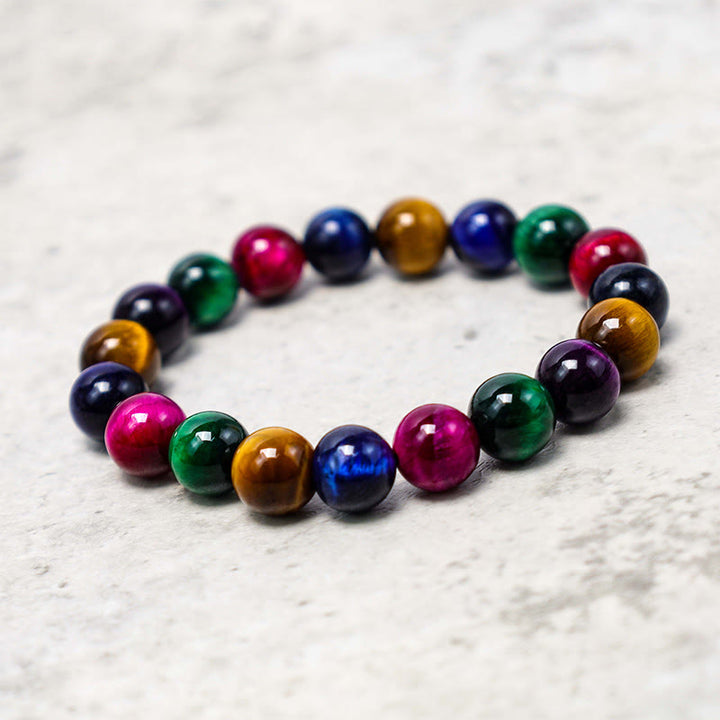 Armband Tigerauge – Mut bunte Perlen Naturstein elastisch getragen