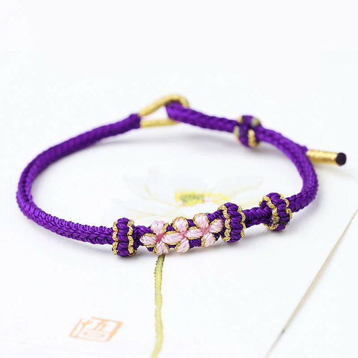 Armband Pfirsichblüte – Glück lila Blume Perlen verstellbar elastisch