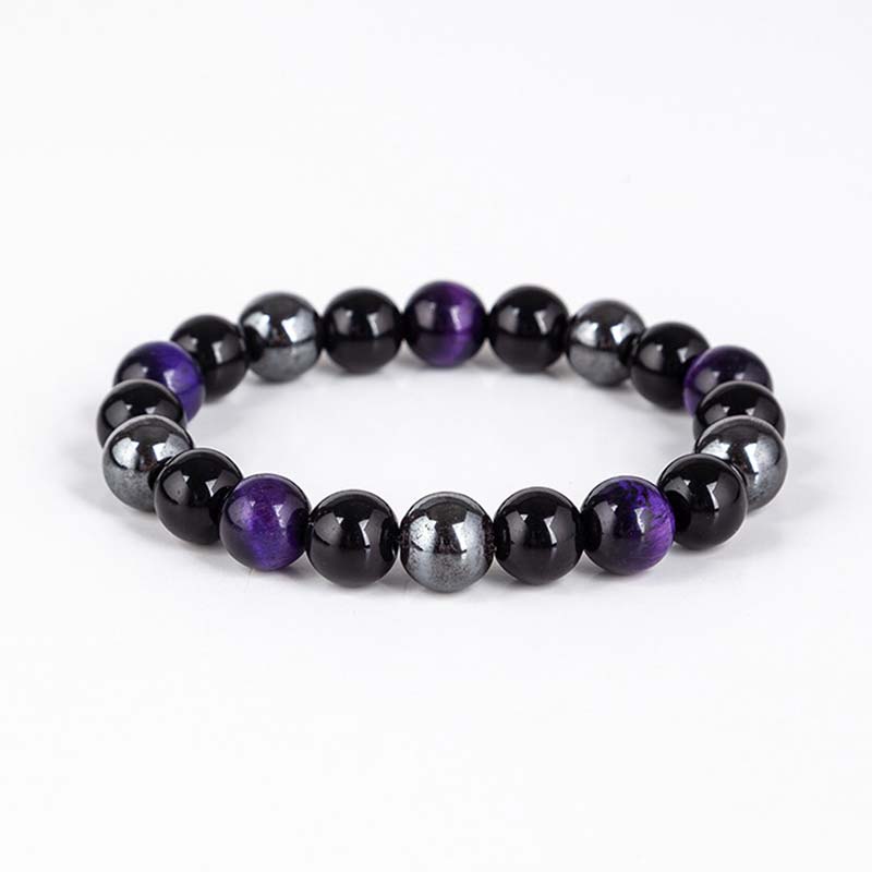 Armband mit schwarzem Onyx, Tigerauge und lila Amethyst Steinen
