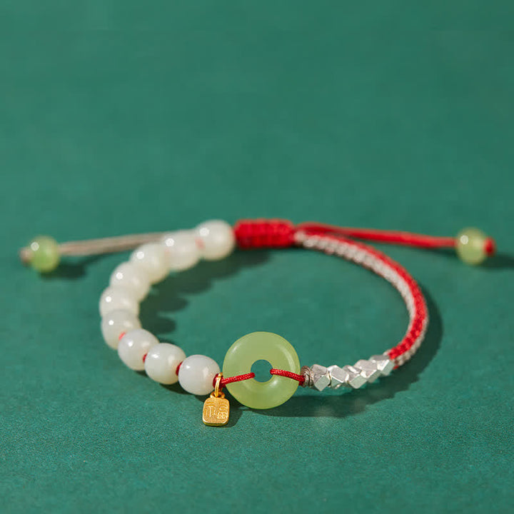 Armband 925 Silber Jade Glück Frieden weiße Perlen rote Kordel