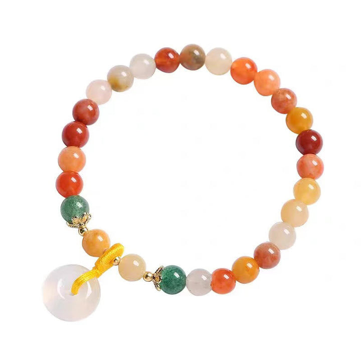 Armband Jade – Wohlstand & Frieden mit orangefarbenen Natursteinen und Anhänger
