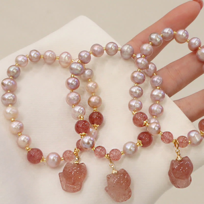 Armband Erdbeerquarz Perle Fuchs mit Perlen eleganter Schmuck Hand.