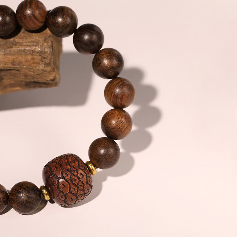 Armband Rosenholz Fu-Zeichen mit braunen Holzperlen und Muster