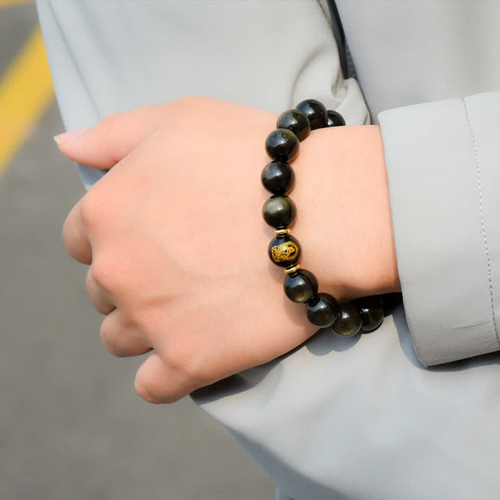 Obsidian Armband Chinesisches Tierkreis am Handgelenk getragen Schutz Wohlstand