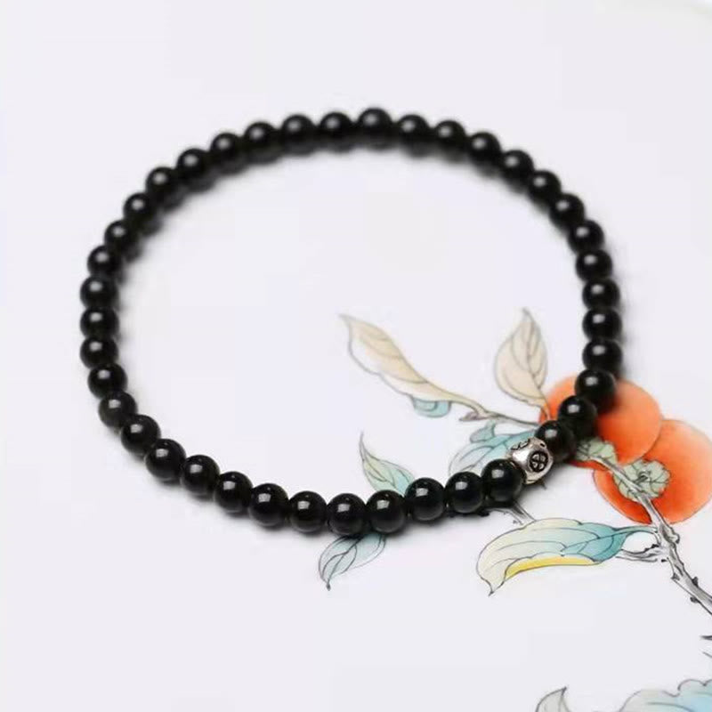Obsidian Armband schwarzer Naturstein mit orangener Katze Charm elegant