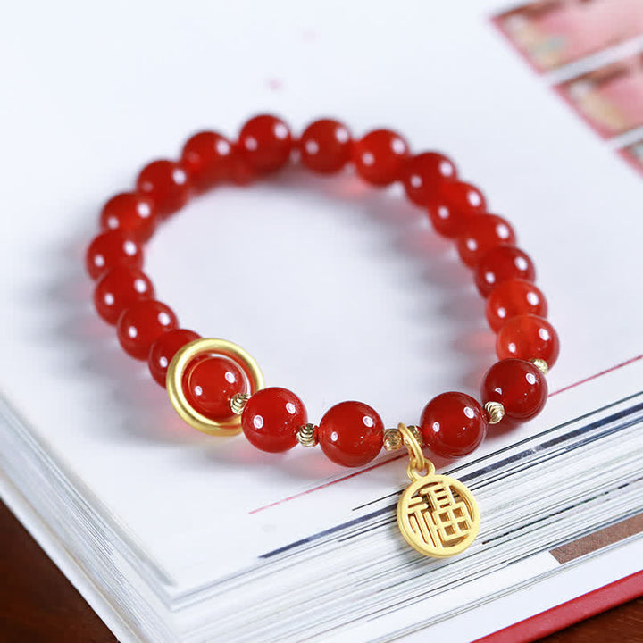Armband Roter Achat – Segen mit goldenem Anhänger elastisch
