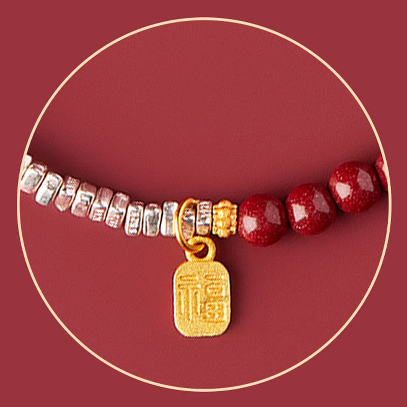 Armband 925 Silber Zinnober Fu-Zeichen am Handgelenk getragen elegant