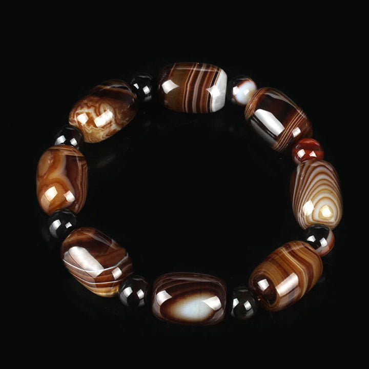 Armband Onyx – Glück & Mut mit braunen Achat Steinen elegant arrangiert