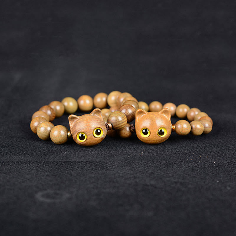 Sandelholz Katzen Armband mit gelben Augen elastisch Perlen