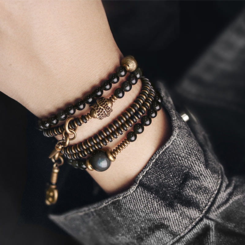 Armband Obsidian Kupfer mehrschichtig am Handgelenk getragen elegantes Design