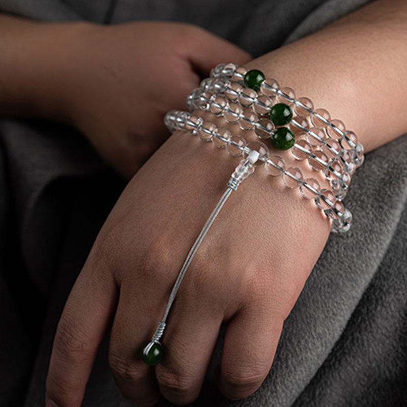 Mala 108 Perlen Weißer Kristall grüne Jade Armband Hand getragen