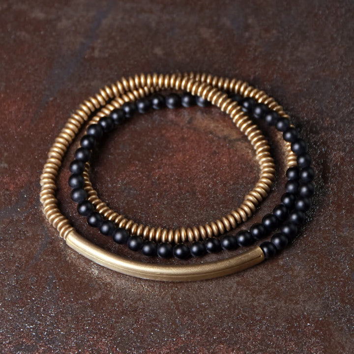 Armband Kupfer Achat – Schutz schwarze Perlen goldene Spirale elegant