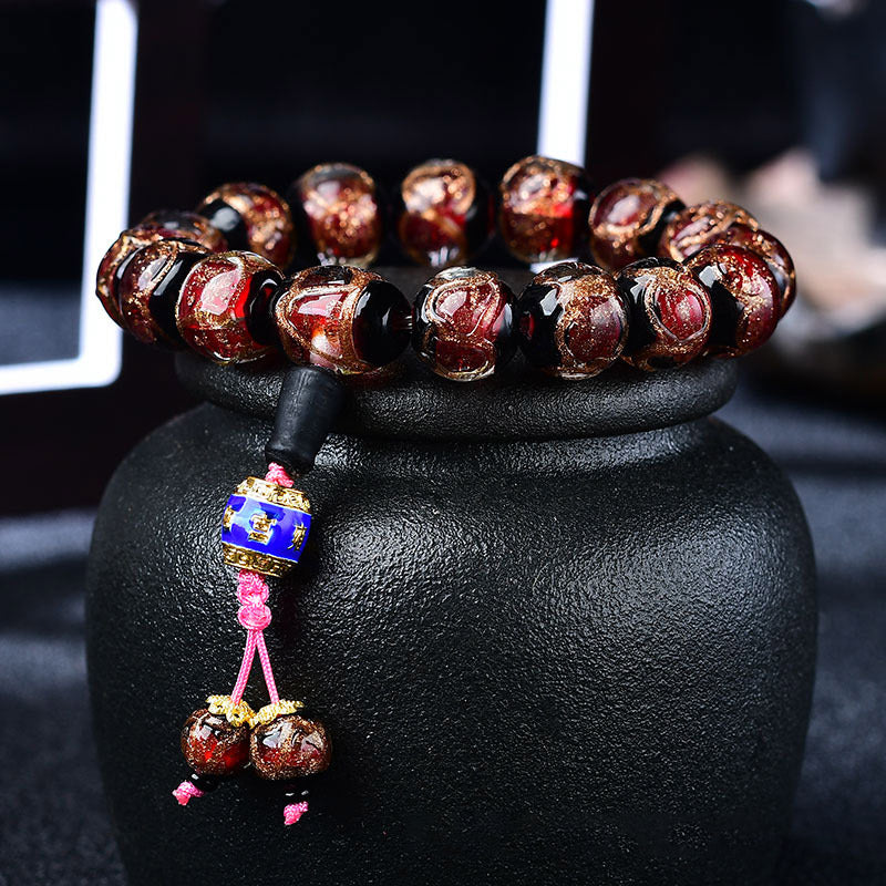 Armband Achat Drachen – Heilung mit roten Perlen elastisch getragen
