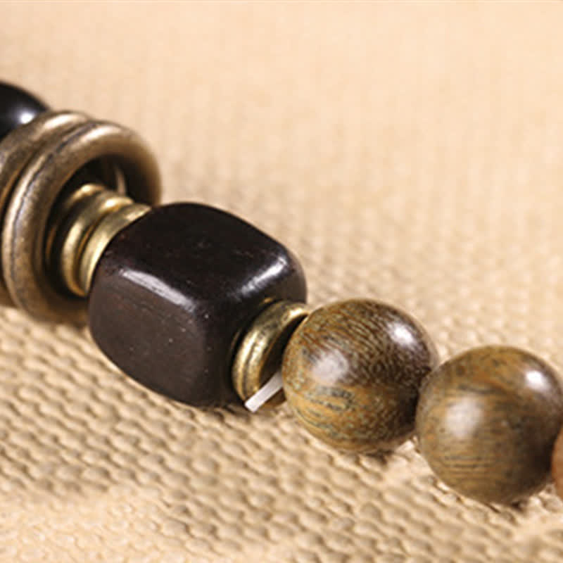 Armband Sandelholz Kristall mit schwarzem Stein Perlen elastisch Naturmaterial