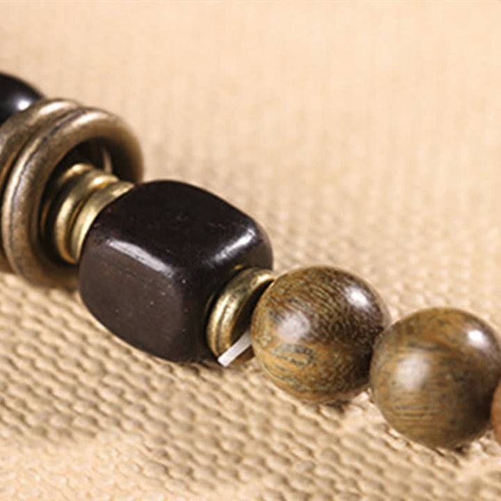 Armband Sandelholz Kristall mit schwarzem Stein Perlen elastisch Naturmaterial