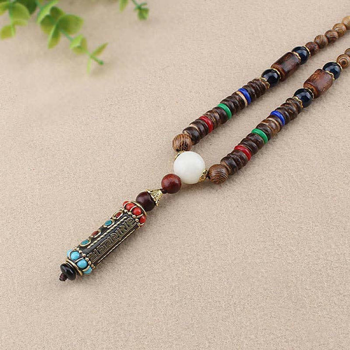 Wengeholz – Weisheit Armband mit Perlen und tibetischem Anhänger Naturstein