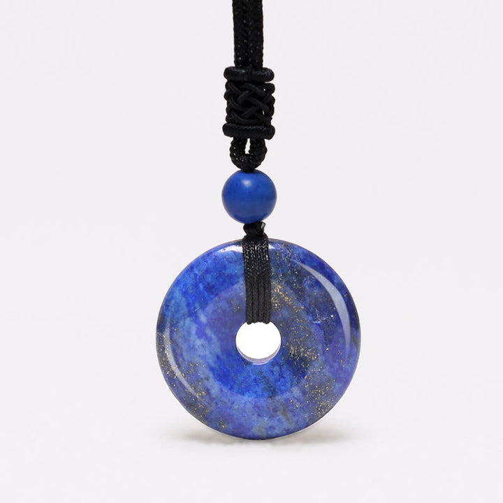 Lapislazuli Donut Kette schwarze Schnur blauer Edelstein Anhänger