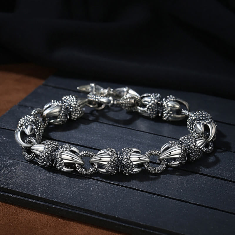 Silbernes Drachen-Armband mit detailreicher Handwerkskunst und SchutzSymbolik.