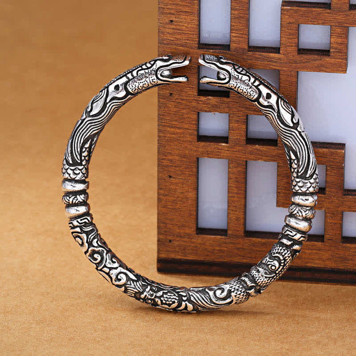 Silbernes Drachen Armband mit Glückssymbolen elegantes Design Schmuck