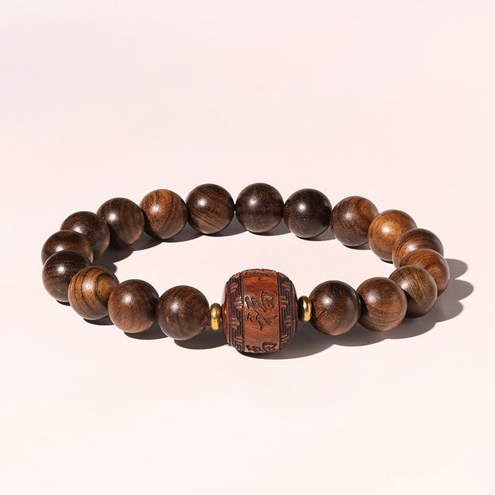 Armband Rosenholz Fu-Zeichen braune Holzperlen elastisch geschnitzt