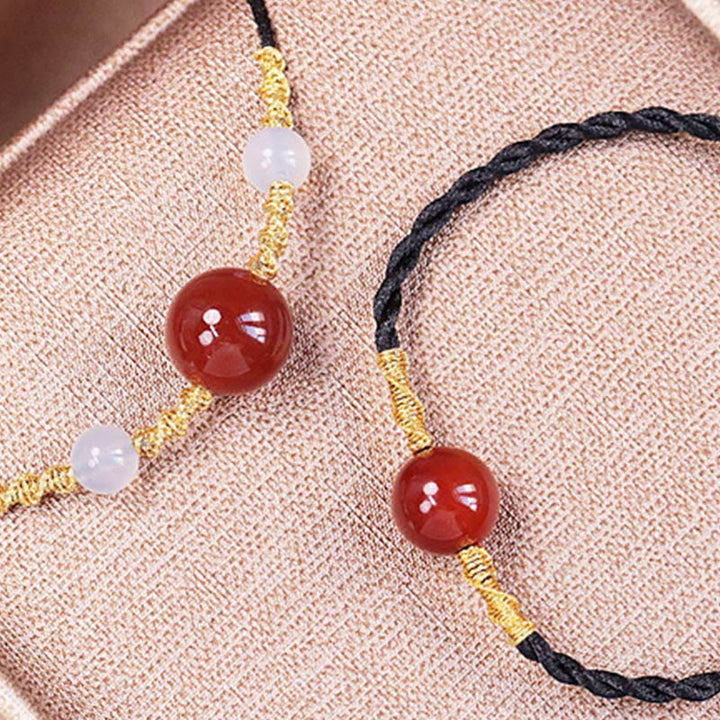 Armband Roter Achat Balance mit Mondstein und goldenem Garn