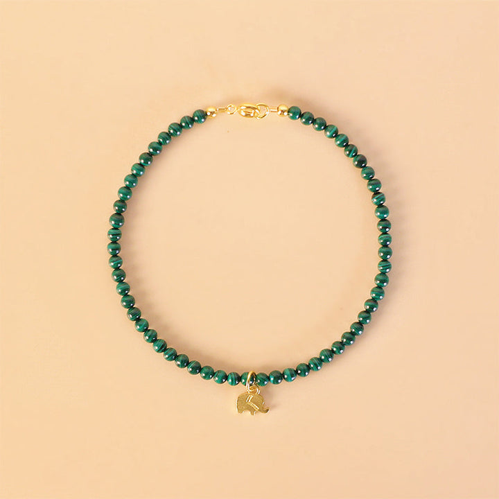 Armband Malachit Elefant grüne Perlen goldener Elefant Anhänger Naturstein