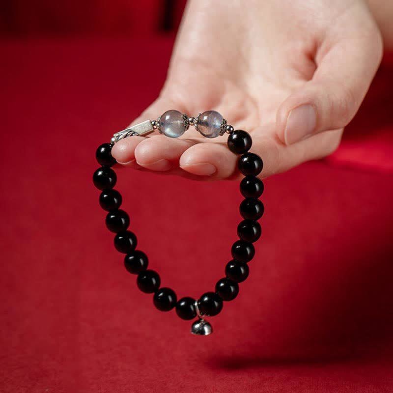 Schwarzes Obsidian Armband 925 Silber Mondstein Paar Stärke getragen