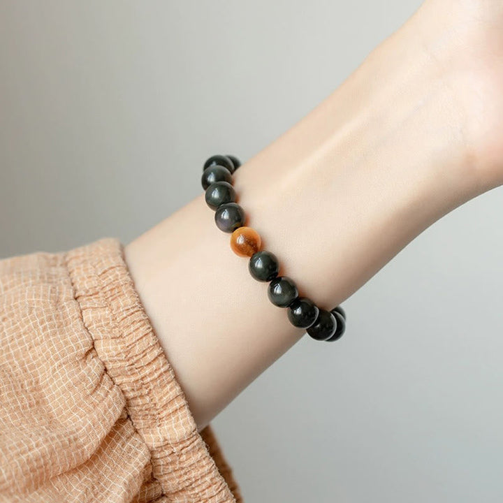Armband Tigerauge Obsidian – Liebe schwarz braun Perlen elastisch Handgelenk