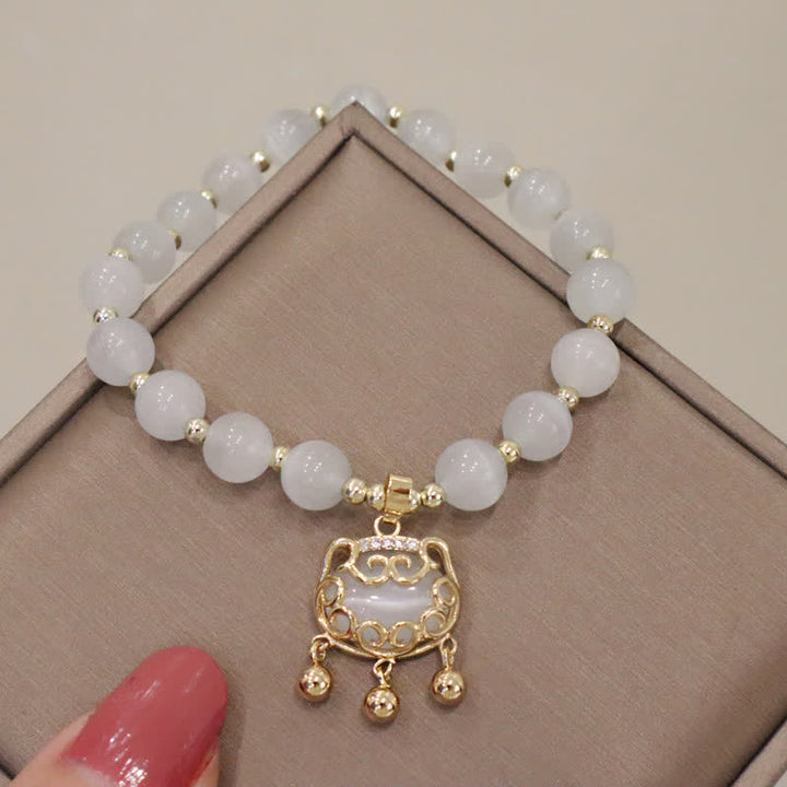 Armband Perle Katze weiße Perlen goldener Anhänger Schmuck