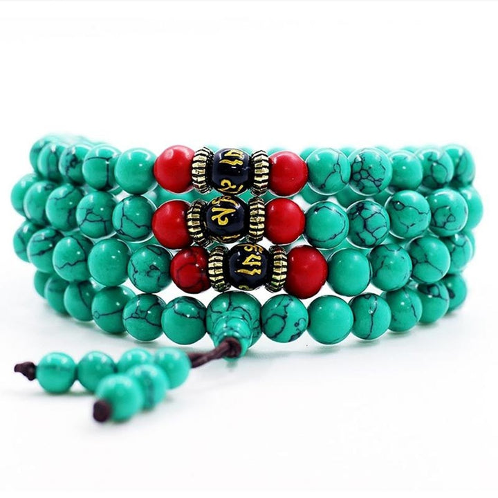 Mala Türkis – Energie Armband mit roten Perlen und schwarzen Spacern elastisch