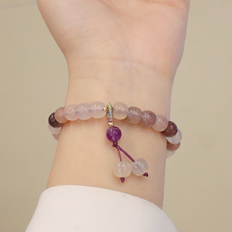 Jade Armband Wohlstand Stärke Perlen lila rosa elastisch Handgelenk getragen