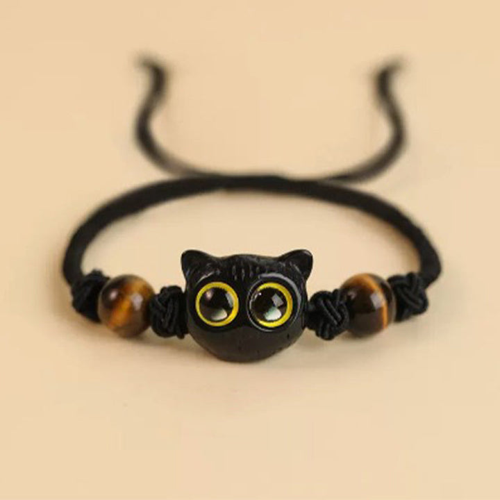Armband Ebenholz Katze mit gelben Augen Tigerauge Perlen schwarz