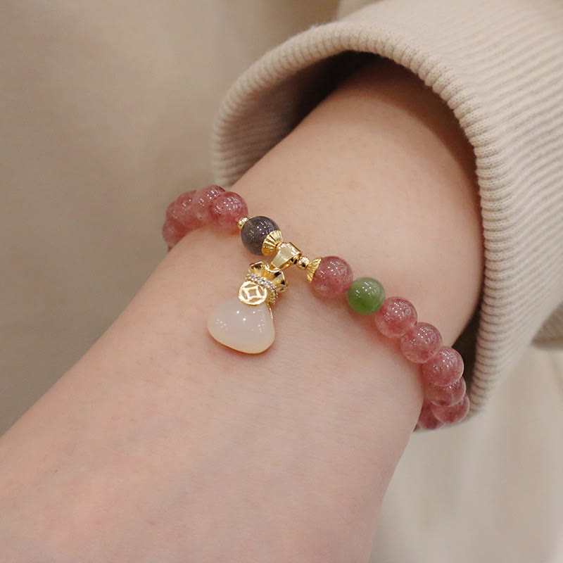 Armband Erdbeerquarz Jade elastisch Naturstein Anhänger Handgelenk getragen