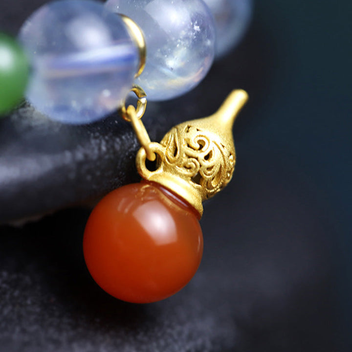 Armband Aquamarin Roter Achat mit goldenem Verschluss elegant.