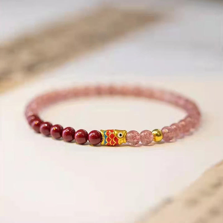 Armband Erdbeerquarz Zinnober Koi Fisch elastisch Naturstein Perlen