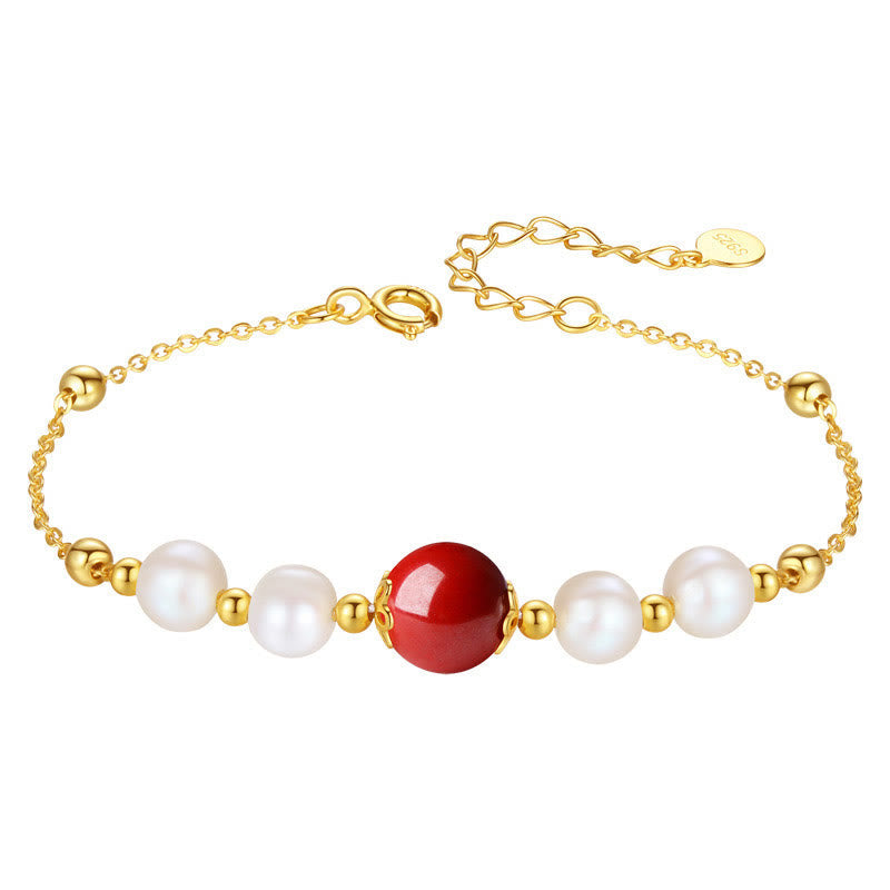 Armband 925 Silber Zinnober mit Perlen und goldenem Verschluss elegant.