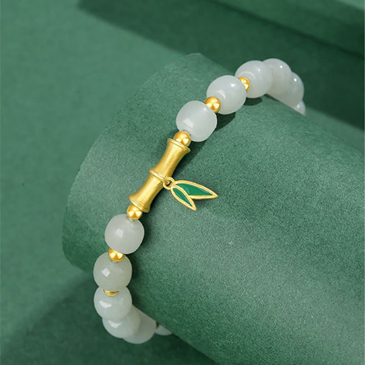 Armband weiße Jade Bambus goldene Perlen elegantes Accessoire am Handgelenk