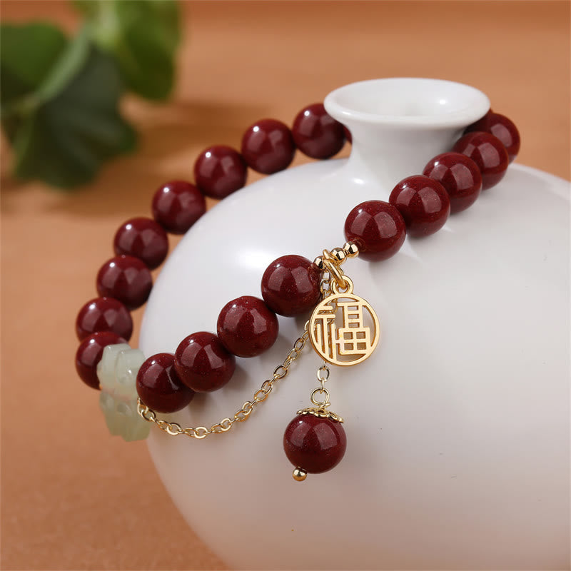 Armband Zinnober Jade Fu-Zeichen Glück Liebe elastisch Naturstein getragen