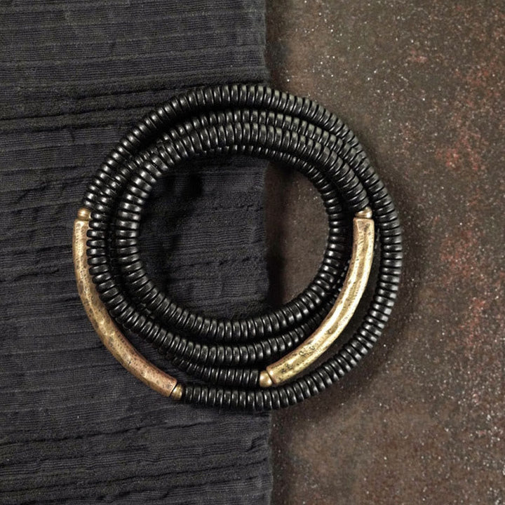 Armband Kupfer Ebenholz Balance schwarze Perlen Metallakzente elegant