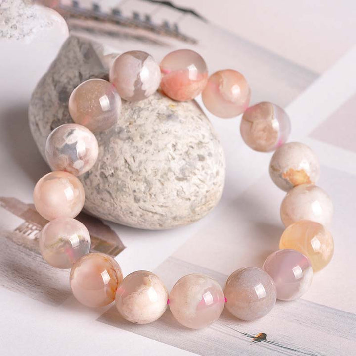 Achat Armband Frieden Segen rosé Perlen Naturstein elastisch Flachlay