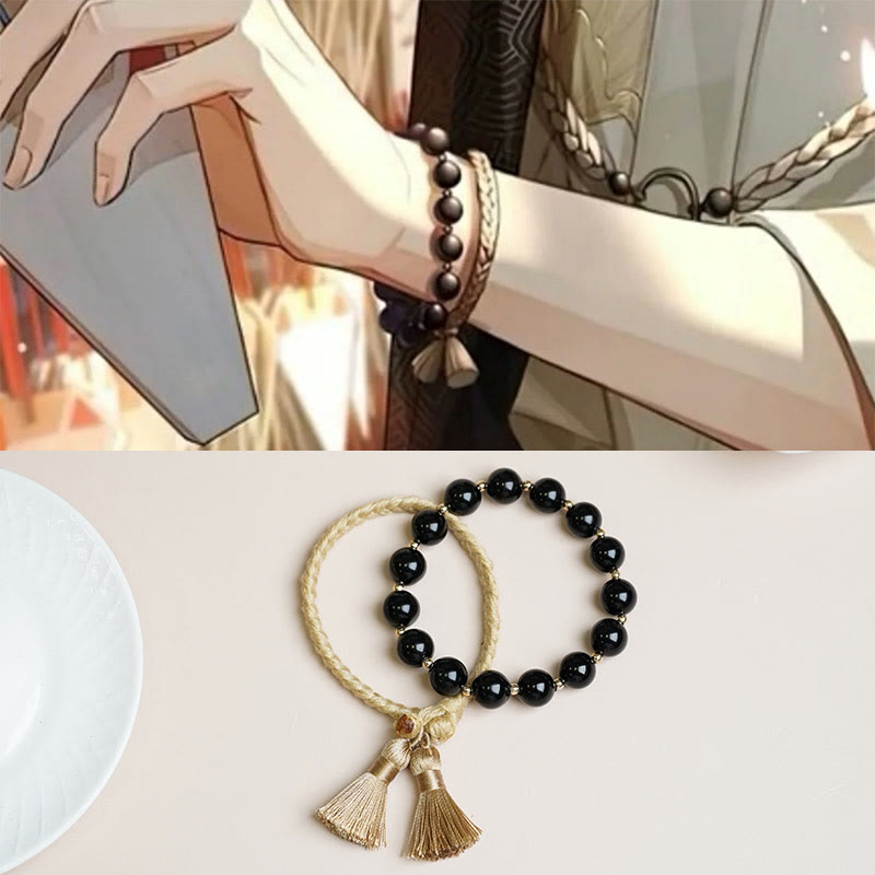 Armband Schwarzer Onyx – Schutz mit Quasten am Handgelenk getragen elegant
