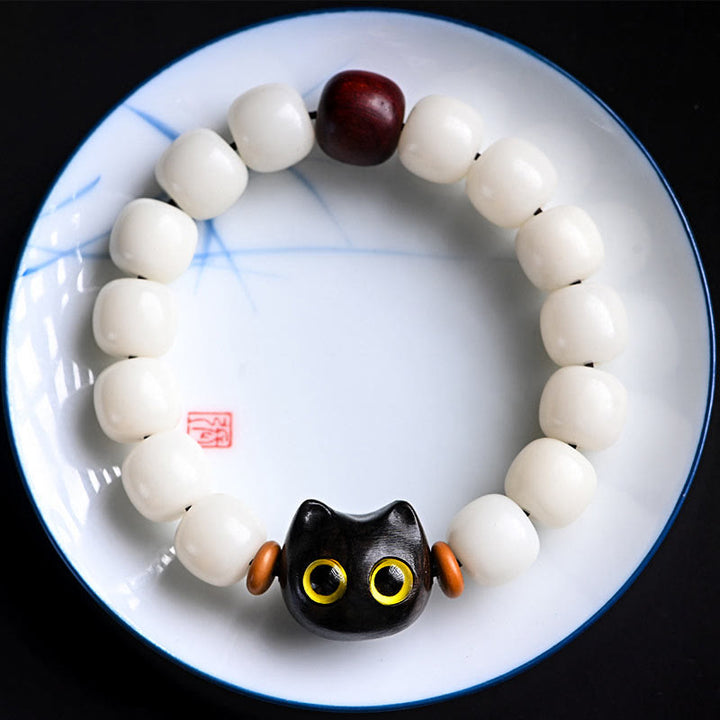 Armband Sandelholz Bodhi Katze – Glück mit weißen Perlen schwarze Katze