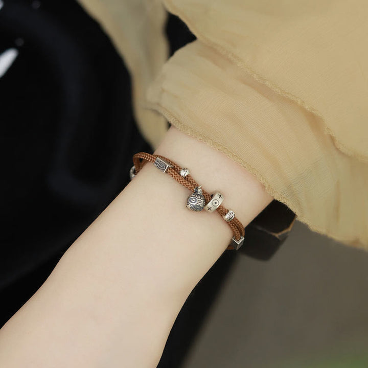 Braunes Armband 925 Silber Koi Fisch Wohlstand elegant getragen