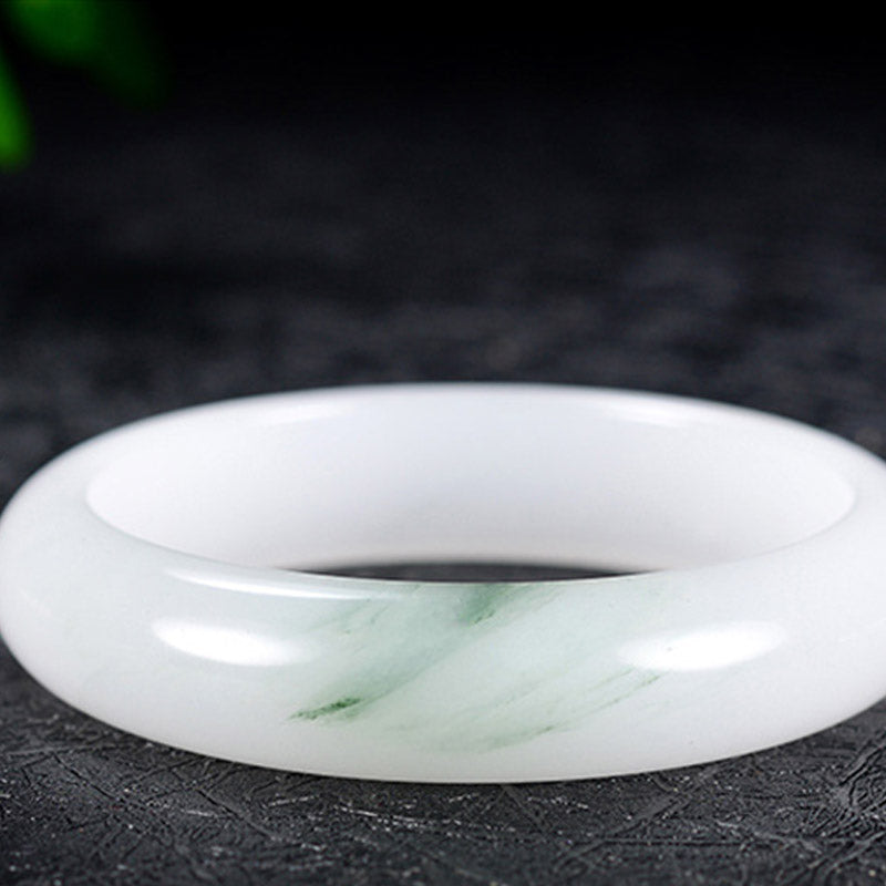 Jade Armband weiß grün gemasert poliert glänzend Naturstein Harmonie