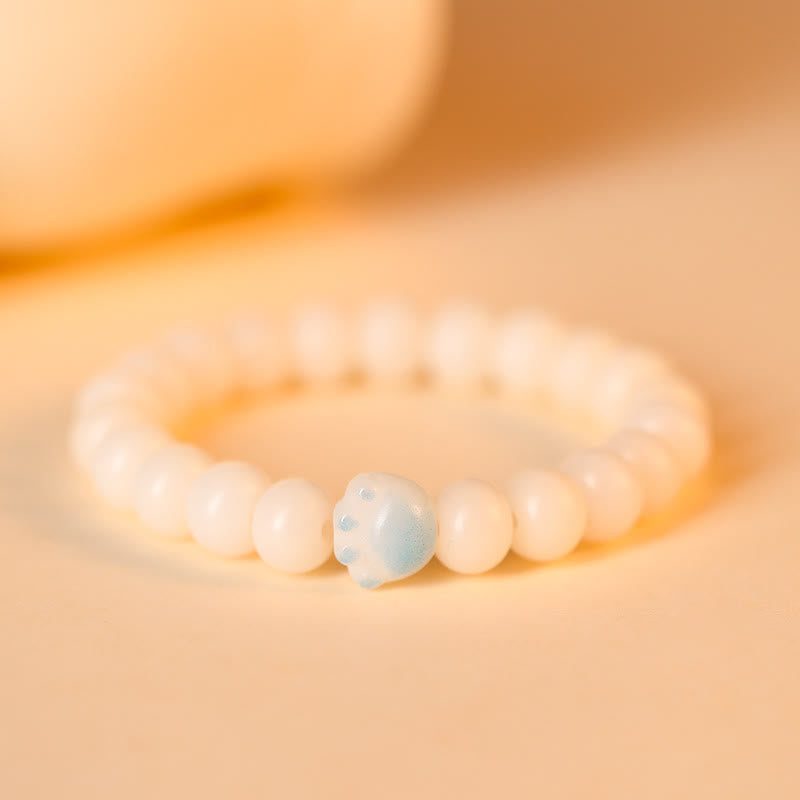 Bodhi Armband mit weißen Perlen und blauem Naturstein Glück