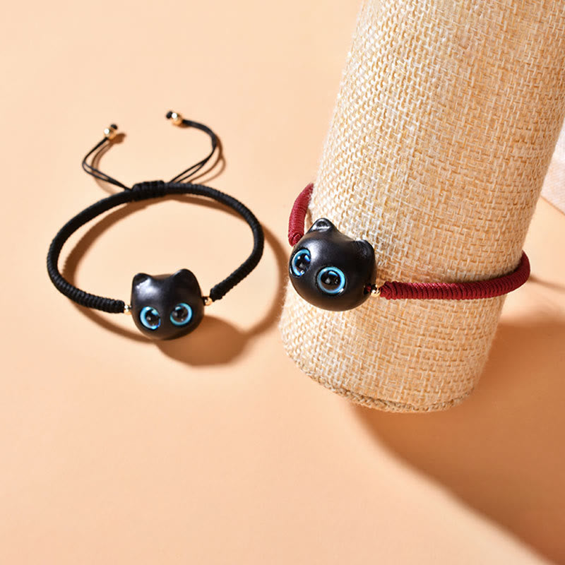 Armband Ebenholz Katze – Frieden am Handgelenk getragen schwarze Perle